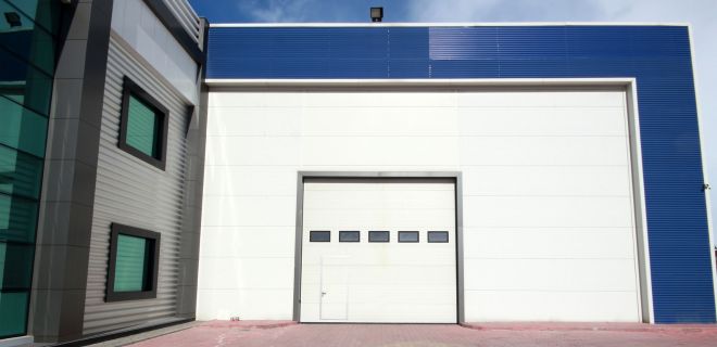 Installation de porte sectionnelle 78130​