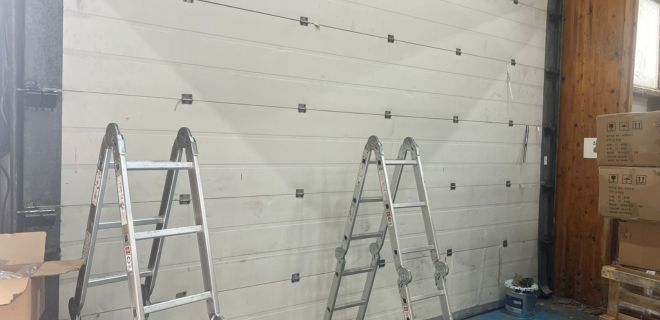 Installation de porte sectionnelle à Bougival​