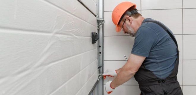 Installation de porte sectionnelle à La Celle Saint Cloud​