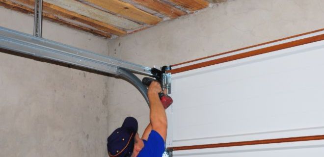 Installation de porte sectionnelle à Saint Cyr l'École​