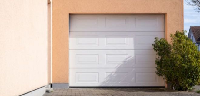 Installation sur mesure de porte sectionnelle à Andrésy​