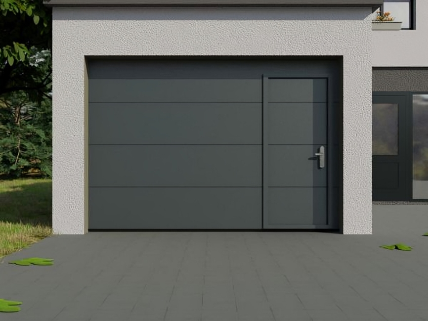Installation d'une porte de garage sectionnelle avec portillon