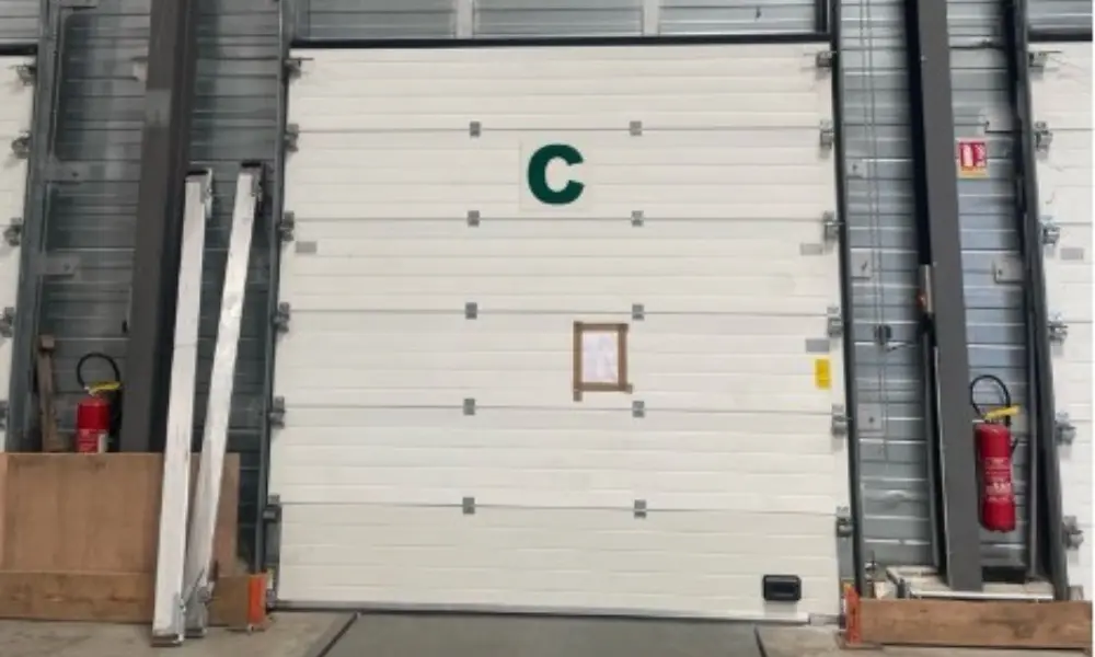 Réparation porte sectionnelle industrielle Arras (62000)