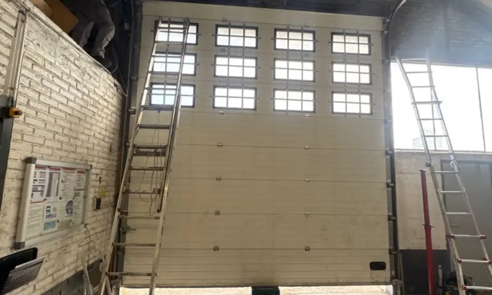 Réparation porte sectionnelle industrielle Avion (62210)