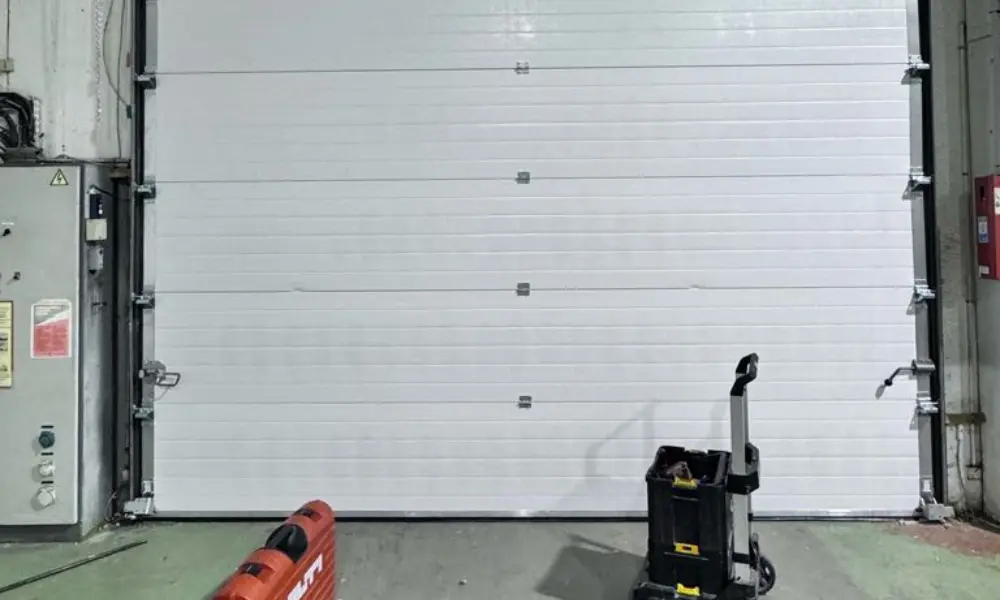 Réparation porte sectionnelle industrielle Outreau en urgence