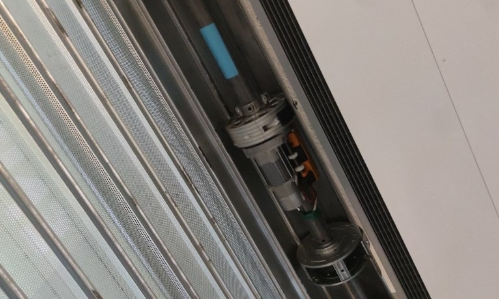 Changement moteur rideau métallique